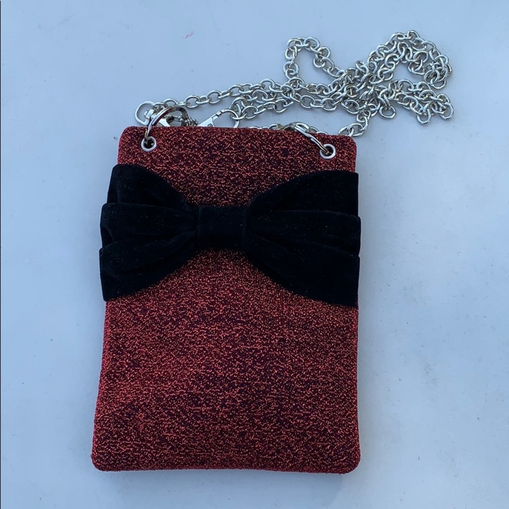 Brand new glittery red and black bow purse